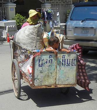 Recycling cart with child