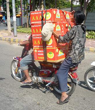 A load of boxes on a motorcycle