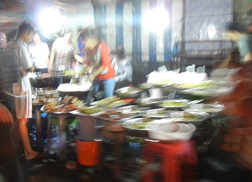 Serving food at a night market