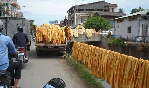 Tablecloths drying on the street