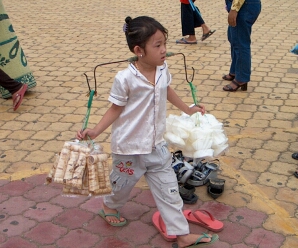 A very young hawker