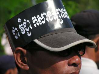 Protest banner on a hat