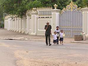 Guard walking children on the street