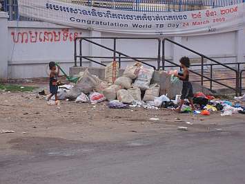 Kids playing on a trash heap