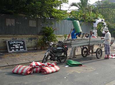 Taking down a funeral tent