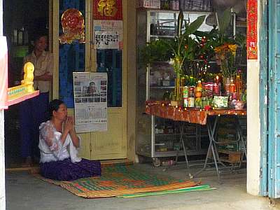 Praying at a shrine