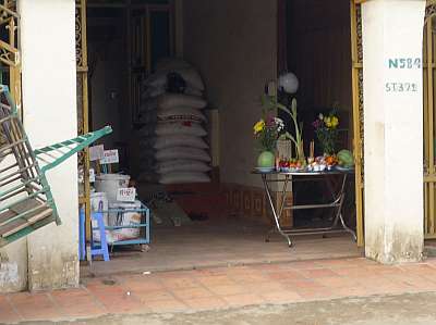 Shrine at shop selling rice