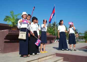 School girls with flags at the ceremony