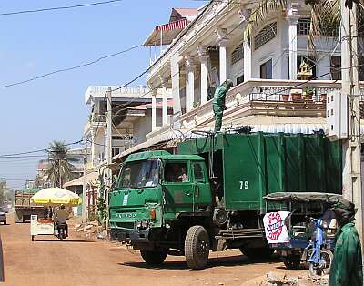 Garbage truck and power lines