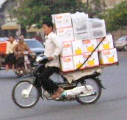 Load of boxes on a motorcycle