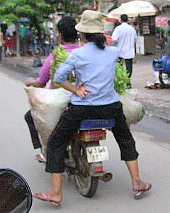 Load of vegetables on a motorcyle
