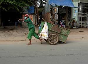 Street sweepers work on the holiday