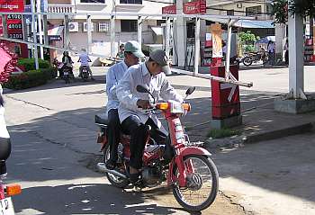 A ladder on a motorcycle