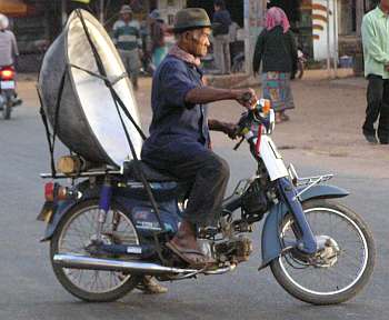 Huge cooking  wok on motorcycle