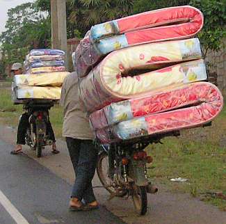 A few mattresses on motorcycles