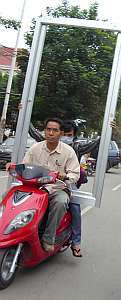 Motorcyle carrying a door frame