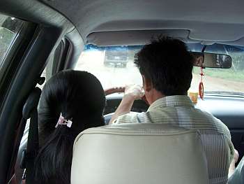 Two people in driver's seat