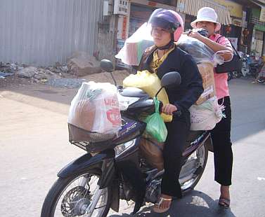 Two women on a motorcycle