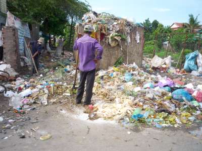 Shoveling garbage