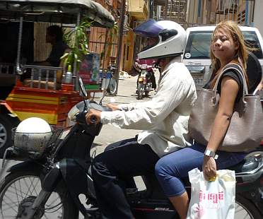 Another helmetless rider