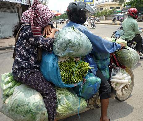 Motorcycle loaded with vegetables