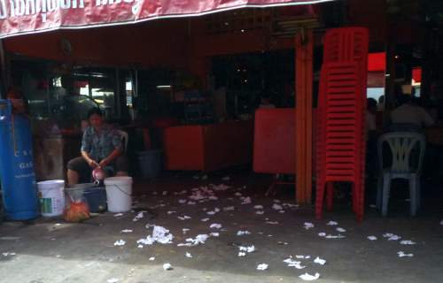 Trash on restaurant floor