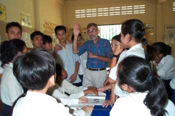 Charlie Dittmeier with students at deaf school