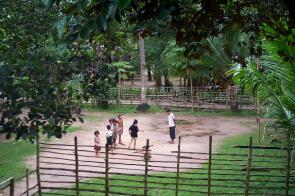 Children playing in front of the church house