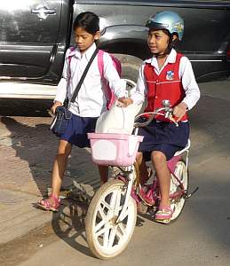 Two girls on the way to school