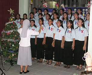 The choir singing Christmas carols
