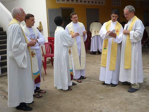 Priests talking beforehand