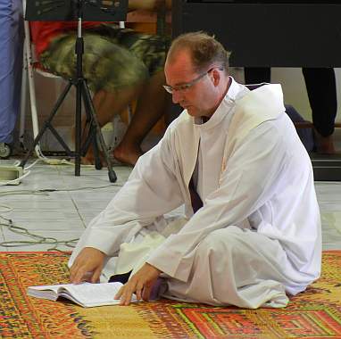 A priest at mass