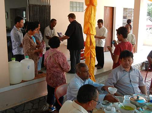 Giving gifts to the center staff