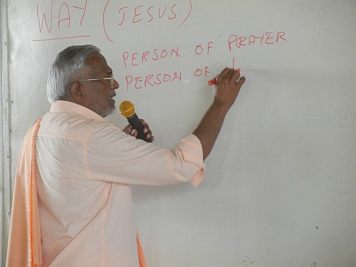 Fr. Louis making a presentation