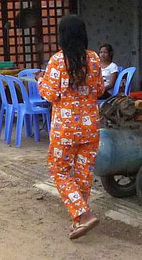Woman in pajamas on the street