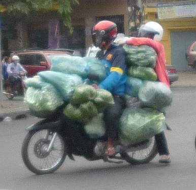 Moto loaded with vegetables