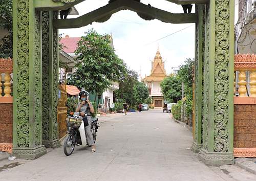 Putting on a helmet at the wat