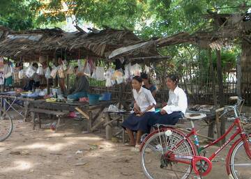 Two girls in small market stall