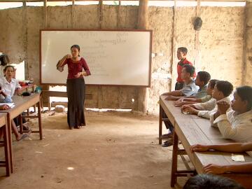 Siya teaching the deaf students