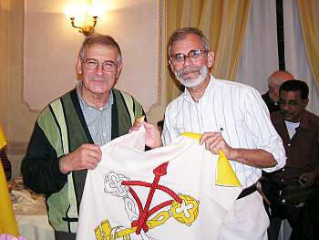 Charlie receiving a Vatican flag