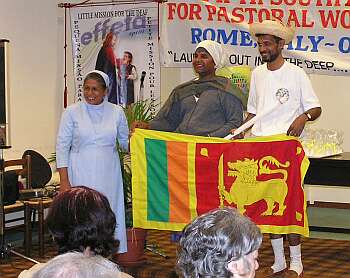 Sri Lanka presents their flag to the organizers