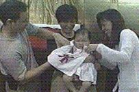 Receiving the baptismal garment