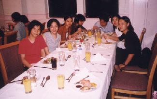 Graduating students at a buffet dinner