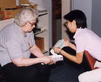 Shirley and Joanna Fong discussing the script