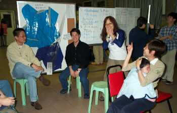 Deaf people enjoying a conversation after mass