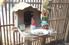 A spirit house at the CDPO office