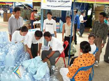 Drinking water booth run by the deaf people