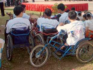 Men in wheelchairs listening to the music