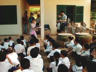 Giving candy to the students