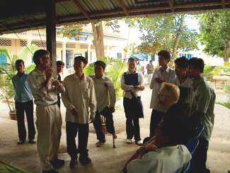 Charlie and students talking